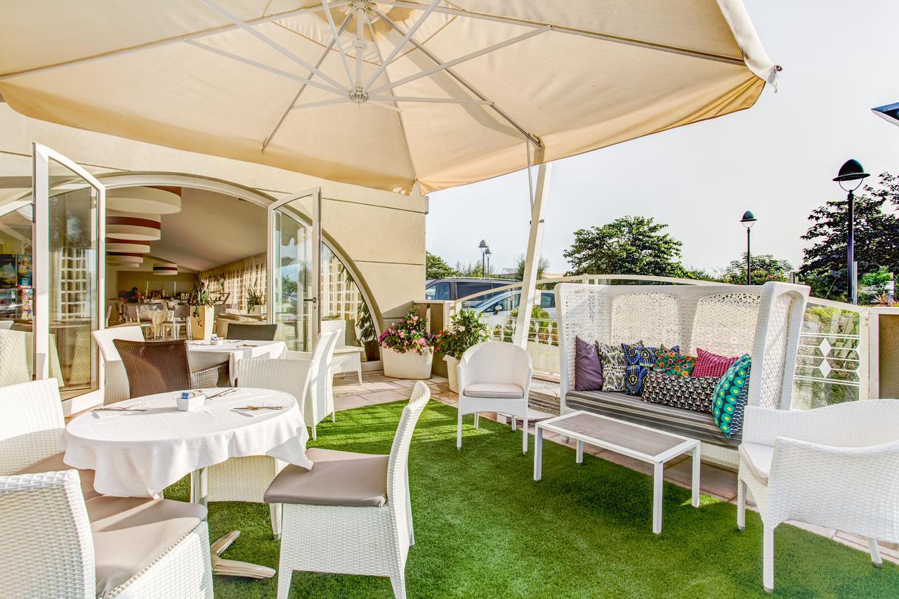 Hotel Brasil Milano Marittima Bagian luar foto