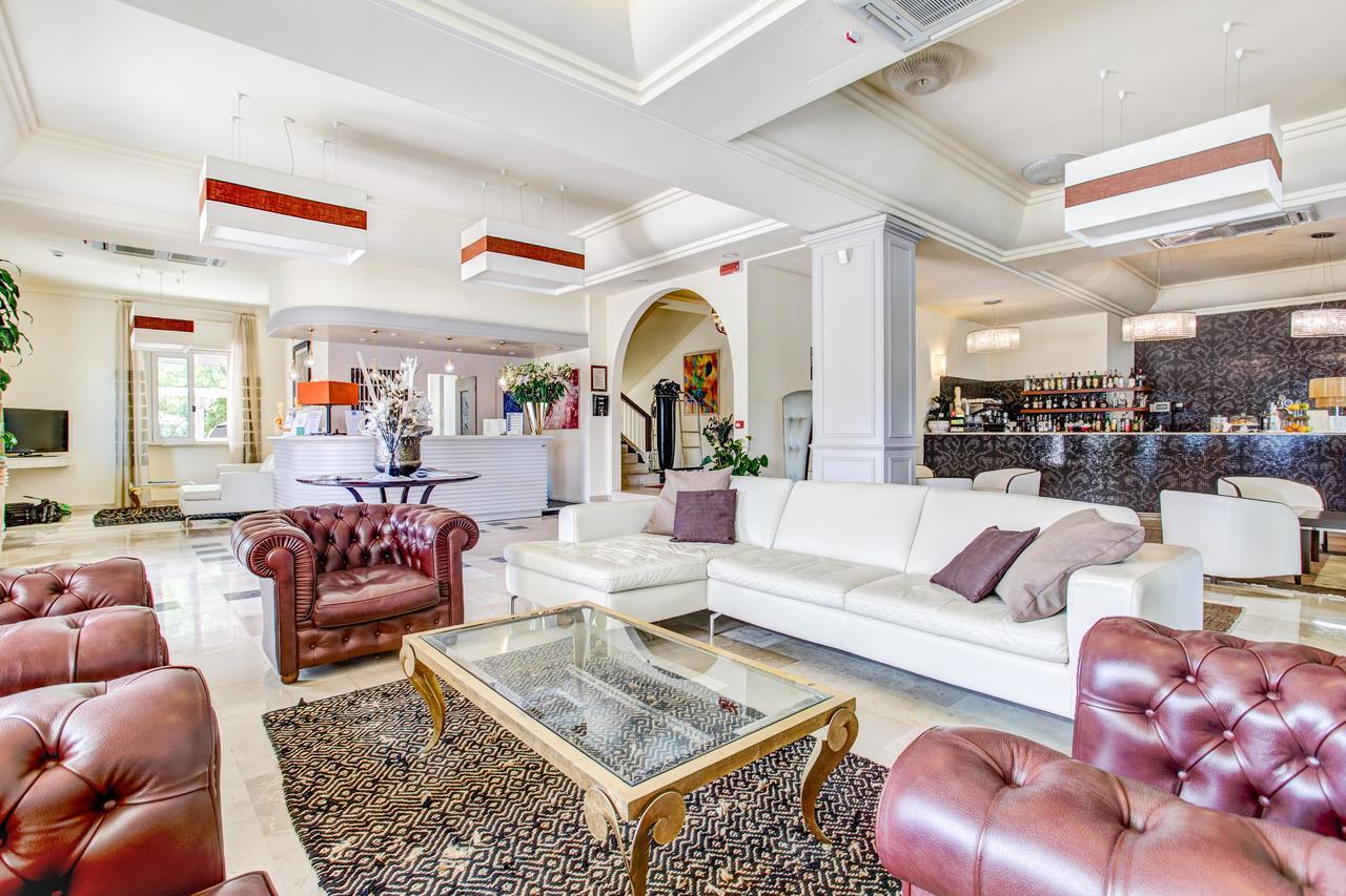 Hotel Brasil Milano Marittima Bagian luar foto